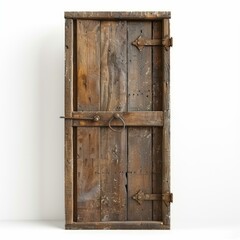 Poster - Rustic wooden door with metal hardware, standing against a white background, creating a contrast between old and new