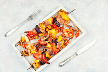 Canvas Print - Delicious meat kebabs on skewers.