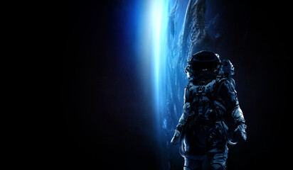 Wall Mural - astronaut at spacewalk. mixed media