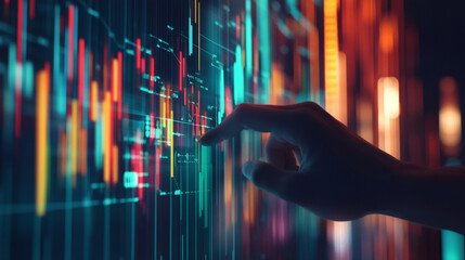 Leinwandbilder - Hand touching interactive digital screen displaying colorful financial charts and data, representing stock market analysis and investment decisions