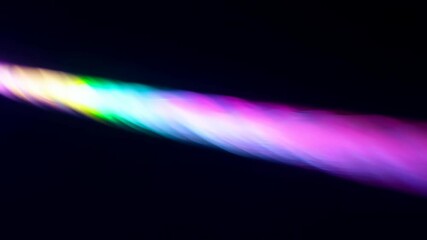 Poster - light beam creates vibrant colors in dark setting during a mesmerizing artistic display