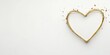© Riz - Golden wire heart shape on white background