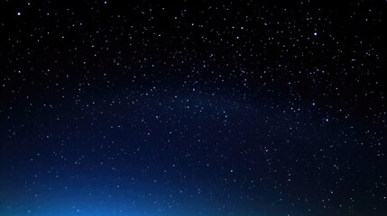 Captivating starry night sky with the Milky Way visible from an angle, dark blue and black background, scattered stars, perfect for night photography, evoking wonder, tranquility,