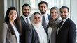 © Michael - Arab business professionals in a contemporary office, showcasing unity and success with their joyful expressions