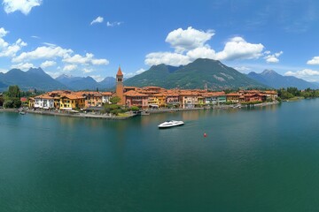 A bird's-eye view of Varena's historic center on Lake Como, with the mountains looming in the background, located in Italy, Europe