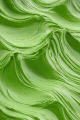 Poster - Vibrant green textured surface showcasing smooth waves of paint, perfect for artistic backgrounds.