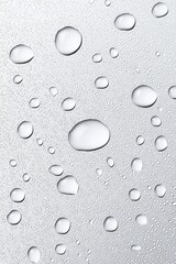Poster - Close-up of water droplets on a smooth surface, creating a calming and refreshing effect.