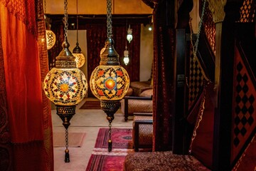 Wall Mural - Ornate Arabic Lamps Illuminate Traditional Decor in a Cozy Space. Generative AI