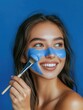 © MK - Woman with blue face paint and brush