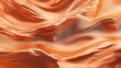 © Anna - Reflective metallic orange texture with smooth wavy patterns and light highlights across the surface, creating a glossy and fluid abstract design.