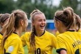 Group of young female soccer players celebrating victory	

