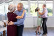 © JackF - Elderly man and elderly woman dance ballroom dance waltz in studio