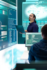 Poster - governmental it expert at work planning advanced cyber attacks on servers infrastructure to gather i