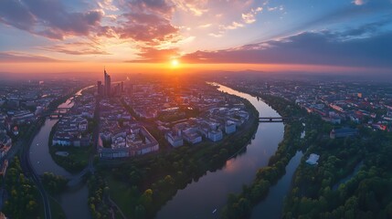Wall Mural - aerial panoramic view of frankfurt at sunset with vibrant clouds and illuminated city skyline along 