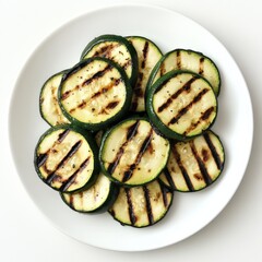 Wall Mural - A clean and simple serving of grilled zucchini slices, neatly arranged on a plain white plate, Zucchini centered