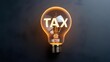 © saokaew - A glowing light bulb with the word 'TAX' illuminated, symbolizing ideas related to taxation and financial awareness.
