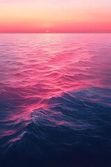 Wall Mural - A mesmerizing sunset over the ocean, featuring vibrant pink and purple hues reflecting on the gentle waves, creating a serene and tranquil atmosphere.