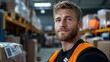 © maesarin - Hardworking warehouse worker wearing a uniform and safety gear loading various boxes and packages onto a forklift inside an industrial warehouse or facility
