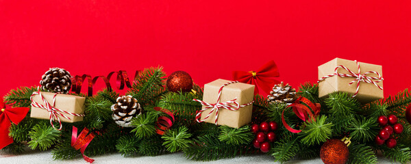 Wall Mural - New Year Christmas tree toy, branches of a christmas tree, New Year decorations on a colored background