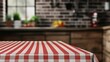 © Pojjanee - Red and White Checkered Tablecloth with Soft Focus Background of Rustic Kitchen Interior Enhancing Dining Atmosphere and Style