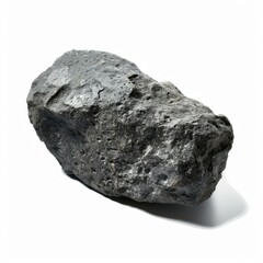 Poster - dark volcanic rock casting a shadow on a white background, creating a stark contrast and highlightin