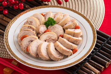 Wall Mural - Delicious sliced chicken roll soaked in Chinese wine for lunar new year's dishes.