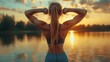 © practice  - Motivated woman celebrating fitness achievement in the morning sun after completing her workout