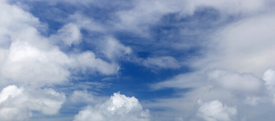 Wall Mural - clouds are in blue sky on a daytime. natural panoramic background