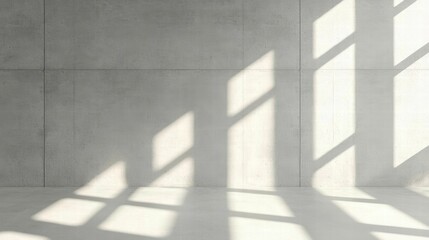 Poster - Minimalist concrete interior with natural light creating geometric shadows on the wall, ideal for modern design themes.