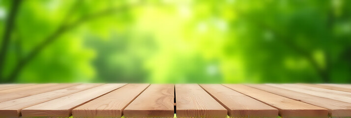 Poster - A selective focus is achieved by centering a wood tabletop within a blurred green tree background scene outdoors naturally._00001_