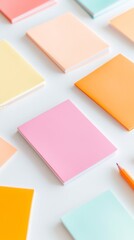 Poster - Vibrant Array of Pastel Notebooks on White Desk