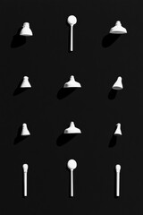 Aufkleber - Noir-Inspired Minimalist Pattern of White Wall Mounts on Dark Background