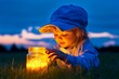 © Thanyarat - A child face full of wonder as they gaze at a glowing jar of fireflies in a twilight field
