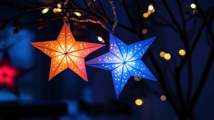 Wall Mural - a couple of colorful stars hanging from a tree