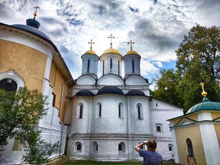 Beautiful architectural details of the Kremlin in Yaroslavl with its golden domes under a dramatic sky