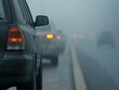 © InkCrafts - Cars navigating through dense fog on a highway, showcasing driving challenges.
