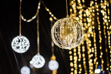 Poster - A bunch of lights hanging from the ceiling, ideal for party or event decoration