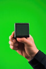 Poster - A person holding a camera, ready to capture the moment