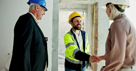 Poster - Architect, people and walking with handshake at construction for meeting, partnership and property b2b. Staff, mature manager and introduction for architecture, negotiation and renovation onboarding