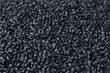 © New Africa - Pile of black plastic granules as background, closeup