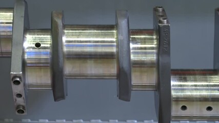 Poster - The metal crankshaft of the engine rotates during testing and servicing
