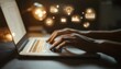 © Mikhail Vorobev - A cozy workspace with floating energy icons above a person typing on a laptop in soft lighting