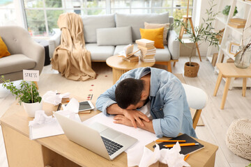 Sticker - Stressed young man working at home