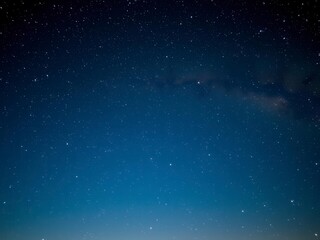 Wall Mural - an enchanting view of a starry night sky filled with twinkling stars and galaxies, scenic, stars, be