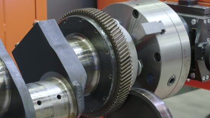 Poster - The metal crankshaft of the engine rotates during testing and servicing