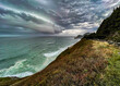 © Jim - Oregon Coast with clouds and bulge.