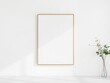 © sawaratch - Minimalist wall art mockup featuring a blank canvas on a clean white wall, modern, white