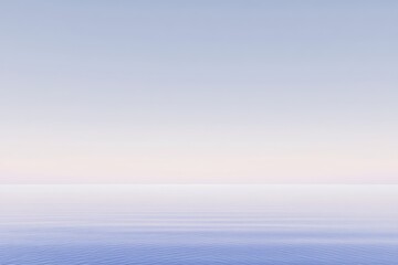Wall Mural - Serene pastel sunrise over calm ocean.