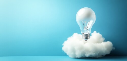 Poster - Lightbulb on a cloud against a blue background.