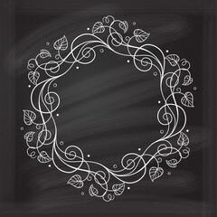 Wall Mural - An Elegant vintage style floral wreath on a chalkboard background, perfect for a variety of invitations, cards, or decorative purposes